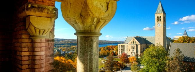 Cornell University in the fall with McGraw Tower and Cayuga Lake.